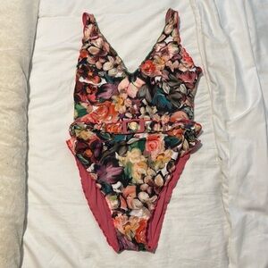 Brand new never worn Becca one piece! Absolutely stunning in person!